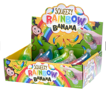 12CM SQUEEZY RAINBOW BANANA 4 ASST (DB